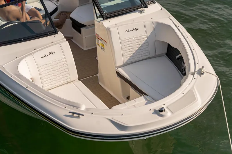 Slide: The Image of Manufacturer Provided Image: 2023 Sea Ray SPX 190 boat interior with white seating and open bow design. - 36