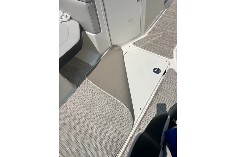 Slide: The Image of 2023 Sea Ray SPX 190 interior flooring and seating detail. - 18