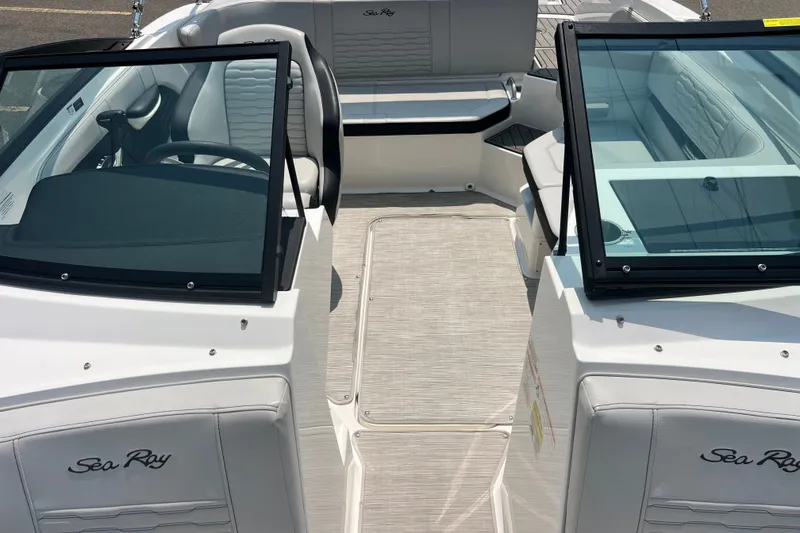 Slide: The Image of 2023 Sea Ray SPX 190 boat interior with sleek seating and modern design. - 13