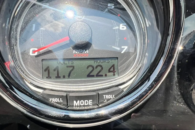 Slide: The Image of Close-up of 2023 Sea Ray SPX 190 dashboard showing RPM gauge and digital display. - 3