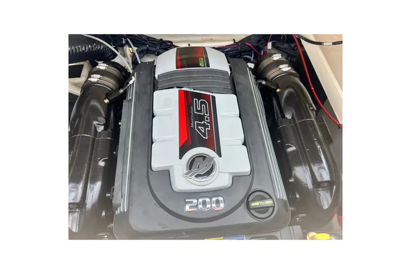 Slide: The Image of Engine of 2023 Sea Ray SPX 190 boat, featuring a 4.5L MerCruiser 200 horsepower. - 1