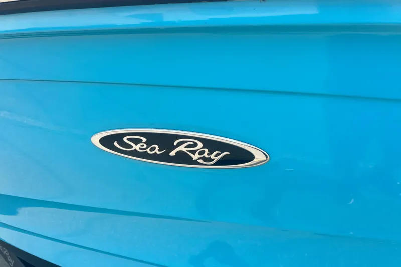 Slide: The Image of 2023 Sea Ray SPX 190 boat logo on vibrant blue hull. - 14