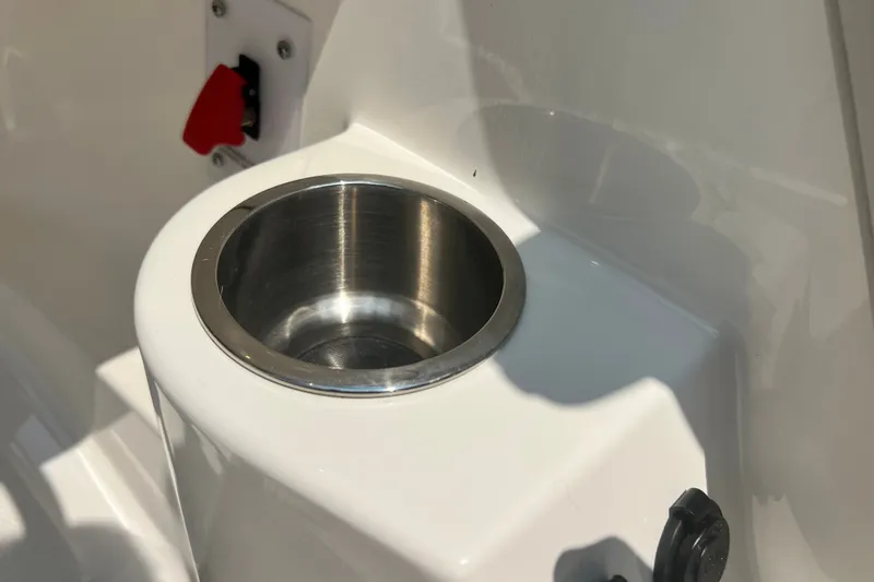 Slide: The Image of Cup holder on 2023 Sea Ray SPX 190 boat, featuring sleek stainless steel design. - 26