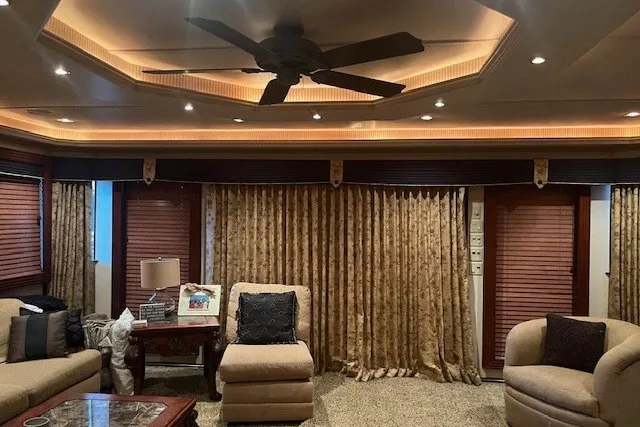 Slide: The Image of Luxurious living room with elegant drapes, plush seating, and ambient lighting, Fantasy 20x100, 2006. - 6
