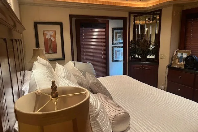 Slide: The Image of Luxurious bedroom interior with elegant decor, featuring a comfortable bed and stylish furnishings, Fantasy 20x100, 2006. - 12
