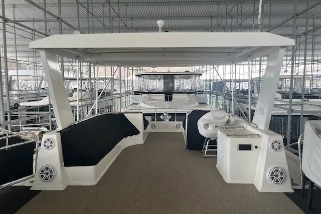 Slide: The Image of Luxurious 2006 Fantasy 20x100 houseboat interior with modern amenities and spacious seating area. - 67
