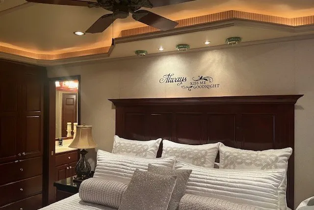 Slide: The Image of Luxurious bedroom with elegant decor, featuring a cozy bed and ambient lighting. - 46