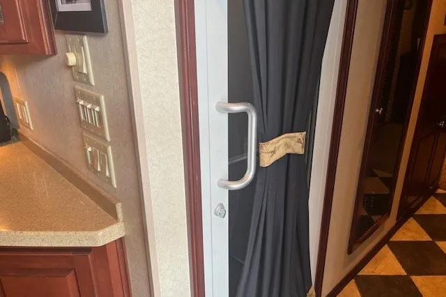 Slide: The Image of Modern RV interior with curtain, countertop, and control panel, Fantasy 20x100, 2006 model. - 22
