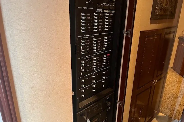 Slide: The Image of Electrical panel inside a Fantasy 20x100 model, 2006, with multiple switches and controls. - 27