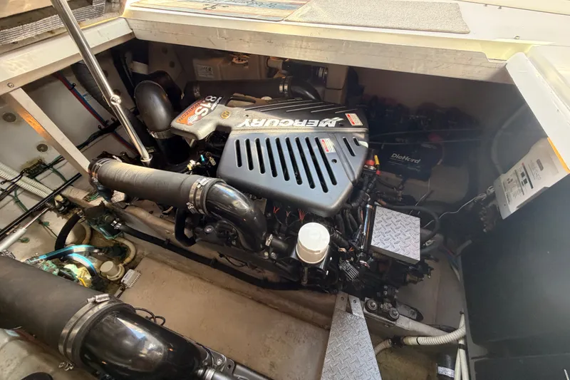 Slide: The Image of Engine compartment of a 2003 Sea Ray 380 Sundancer with MerCruiser engine. - 26