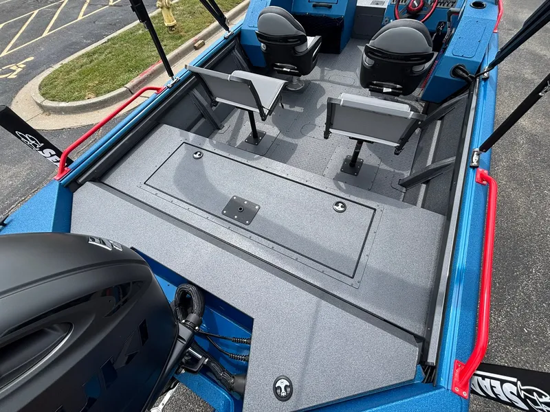 Slide: The Image of The image shows the interior of a 2027 SeaArk Protege 200 boat with four seats. - 24