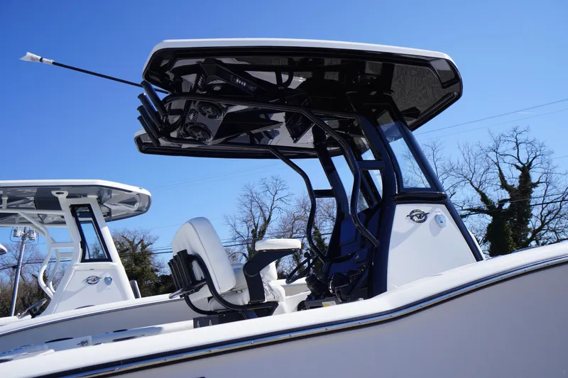 Slide: The Image of 2026 Tidewater 232 CC Adventure boat with sleek design and modern features. - 1
