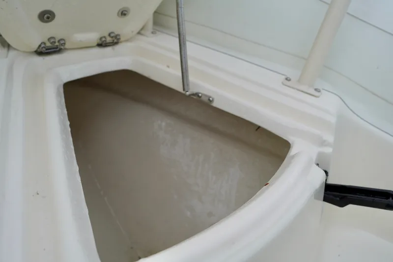 Slide: The Image of Open storage compartment on a 2002 AB Inflatables Nautilus 11 DLX boat. - 3