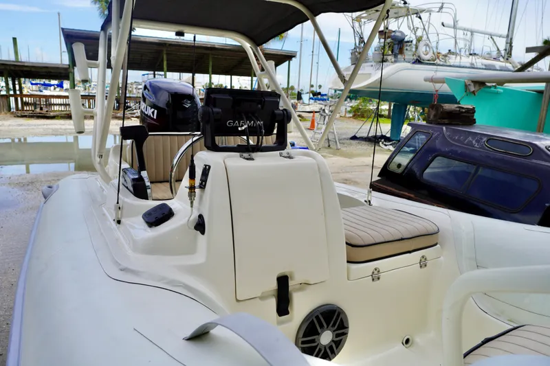 Slide: The Image of 2002 AB Inflatables Nautilus 11 DLX boat with Suzuki engine and Garmin navigation system. - 4