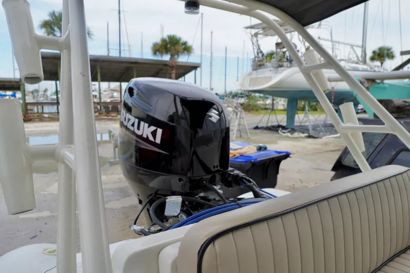 Slide: The Image of 2002 AB Inflatables Nautilus 11 DLX with Suzuki outboard motor at marina. - 18