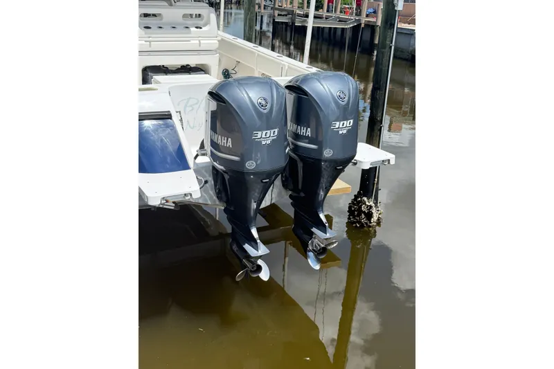Slide: The Image of 2014 Intrepid 327 Center Console with twin Yamaha 300 V6 outboard engines. - 20