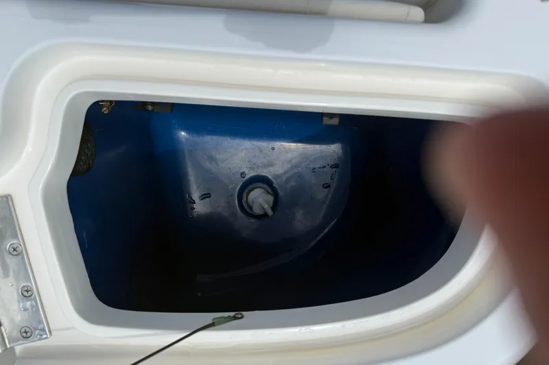 Slide: The Image of Livewell compartment of a 2014 Intrepid 327 Center Console boat. - 18