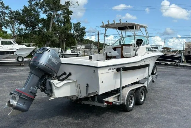 Slide: The Image of 1987 Grady White 22 Sea Farer boat on trailer, featuring Yamaha outboard motor. - 8