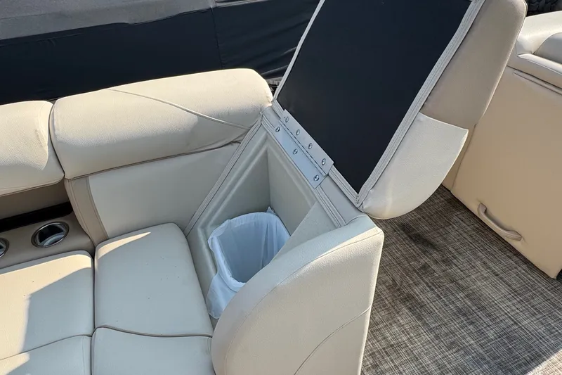 Slide: The Image of 2020 Harris Cruiser 210 boat seat with built-in storage compartment. - 10