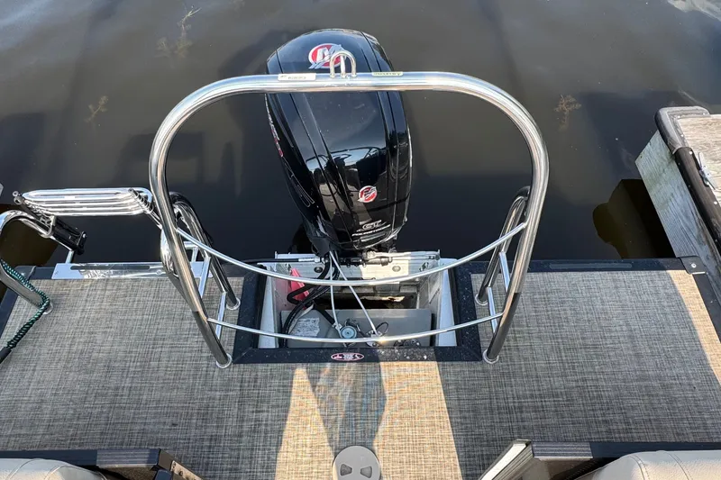Slide: The Image of 2020 Harris Cruiser 210 boat with outboard motor and swim platform. - 14