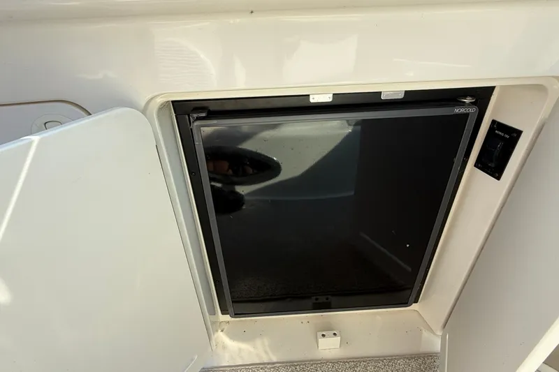 Slide: The Image of Built-in refrigerator on a 2000 Sea Ray 340 Sundancer boat. - 14