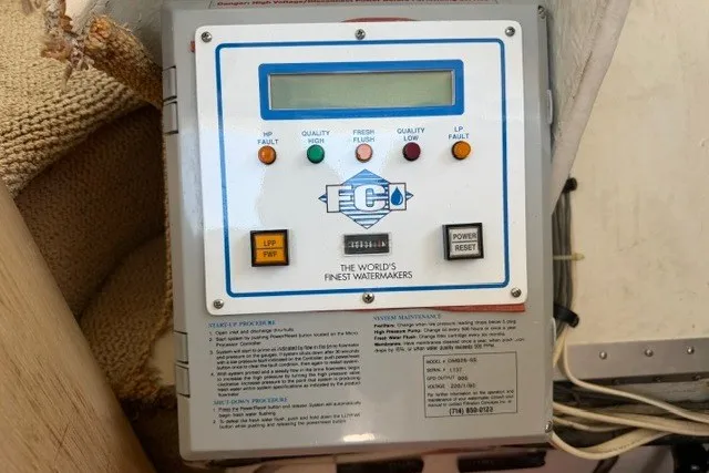 Slide: The Image of Control panel of a watermaker system on a 1997 Maxum 4100 SCA boat. - 43
