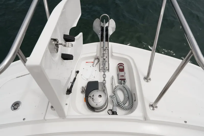 Slide: The Image of The anchor area of a Sea Ray 320 Sundancer DA Coupe with anchor, chain, and controls. - 18