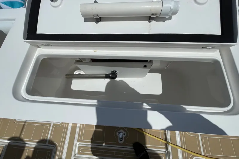Slide: The Image of Open storage compartment on a 2010 Intrepid 390 Sport Yacht deck. - 21