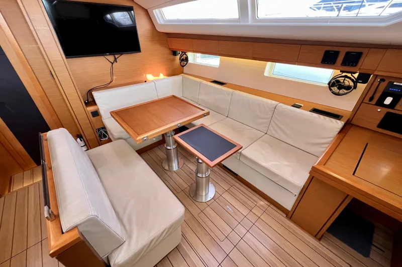 Slide: The Image of Luxurious interior of a 2018 Jeanneau 54 yacht with elegant seating and modern amenities. - 50