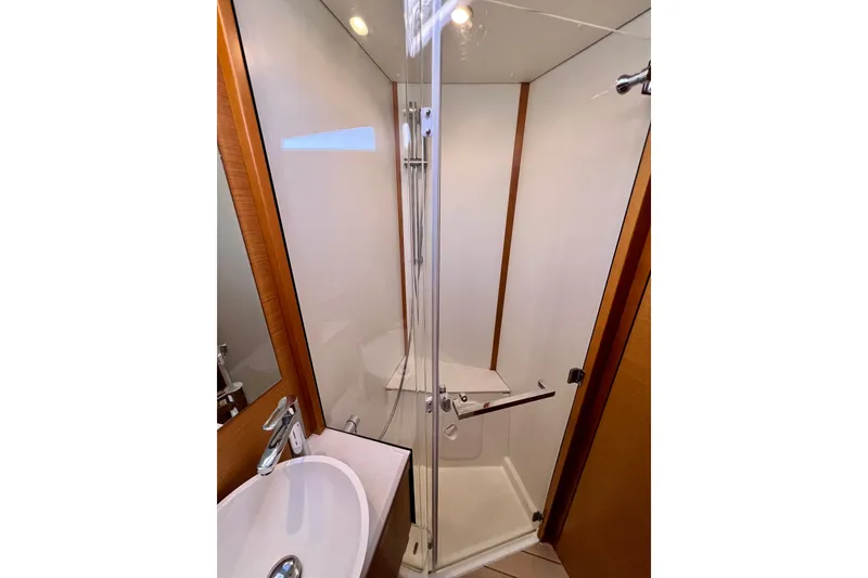 Slide: The Image of Modern bathroom with glass shower in 2018 Jeanneau 54 yacht. - 80