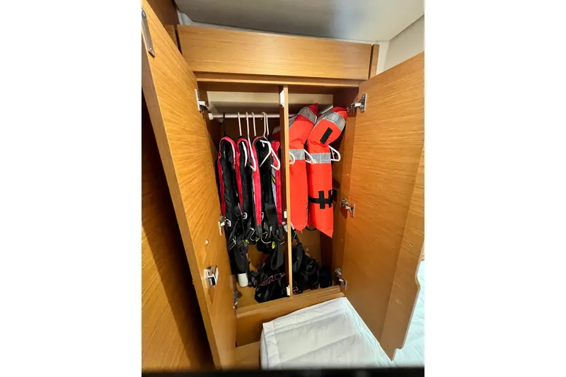 Slide: The Image of Closet on 2018 Jeanneau 54 yacht with life jackets and gear. - 86