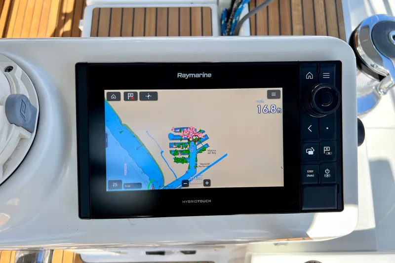 Slide: The Image of Raymarine navigation display on 2018 Jeanneau 54 yacht, showing a coastal map. - 35