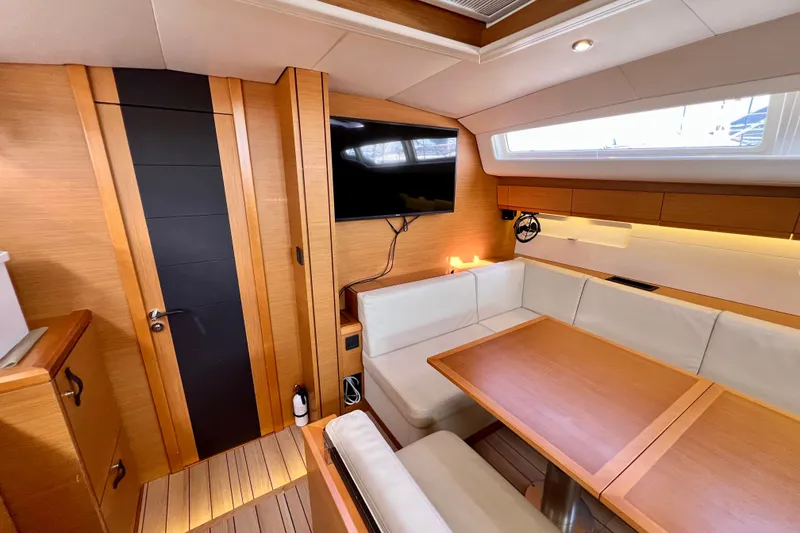 Slide: The Image of Luxurious interior of 2018 Jeanneau 54 yacht with modern seating and entertainment system. - 47