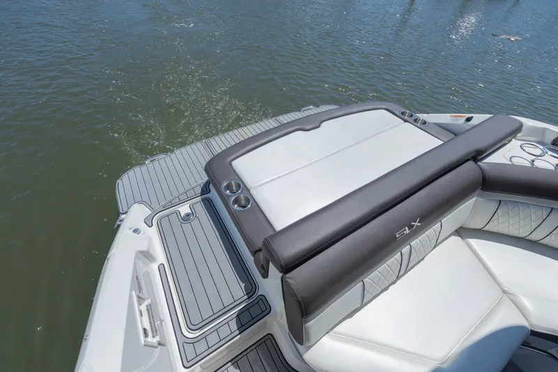 Slide: The Image of The image shows the stern of a 2016 Sea Ray SLX 250 boat on the water. - 5