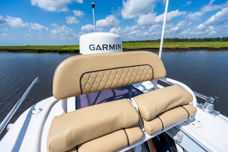 Slide: The Image of 2024 Sportsman Masters 247OE Bay Boat with Garmin equipment on a sunny day. - 12