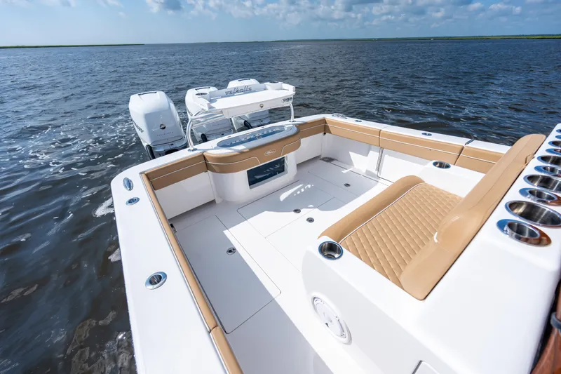 Slide: The Image of 2023 Valhalla Boatworks V-37, luxurious deck view, open water, sunny day. - 29