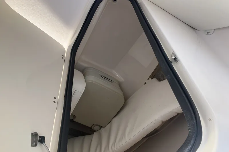 Slide: The Image of Interior cabin view of a 2005 Grady-White Tournament 225 boat. - 9