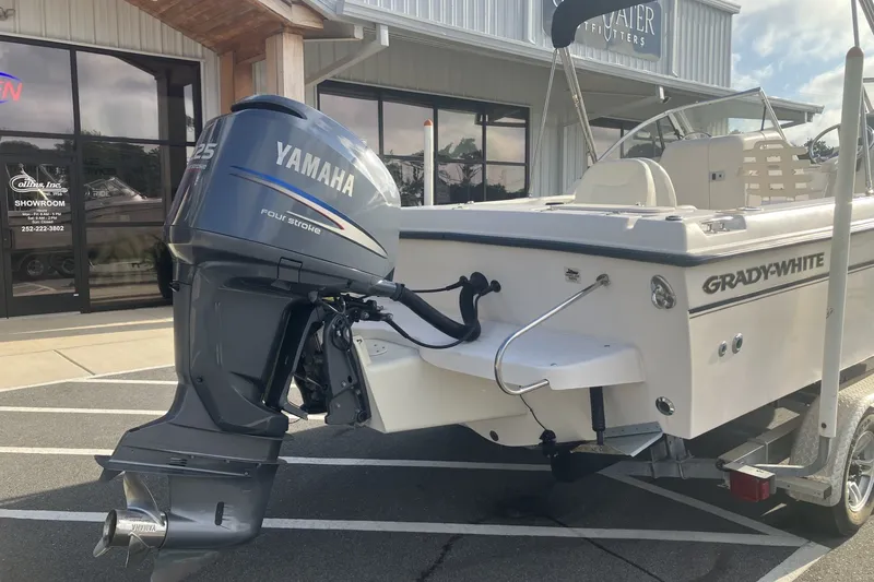 Slide: The Image of 2005 Grady-White Tournament 225 boat with Yamaha 225 four-stroke engine, parked outside showroom. - 6