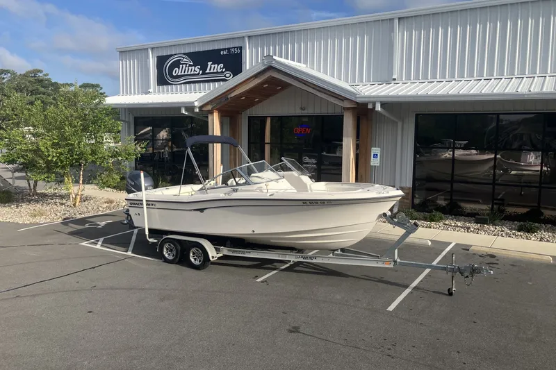 Slide: The Image of 2005 Grady-White Tournament 225 boat on trailer outside Collins Inc. dealership. - 2