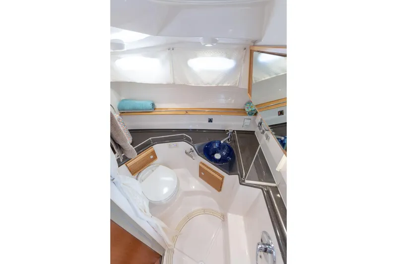 Slide: The Image of Modern bathroom interior of 2027 Cutwater C-32 CB boat with sleek design and amenities. - 31