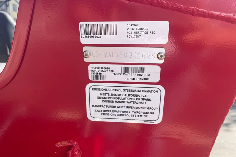 Slide: The Image of 2026 Tracker Pro Guide V-175 WT boat with emissions control information and serial numbers. - 73