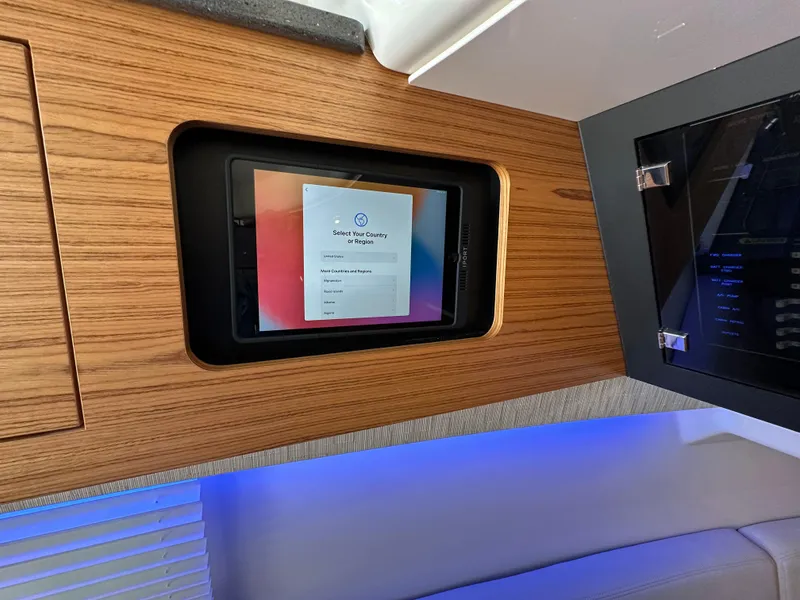 Slide: The Image of 2022 Boston Whaler 380 Realm interior with touchscreen control panel. - 34