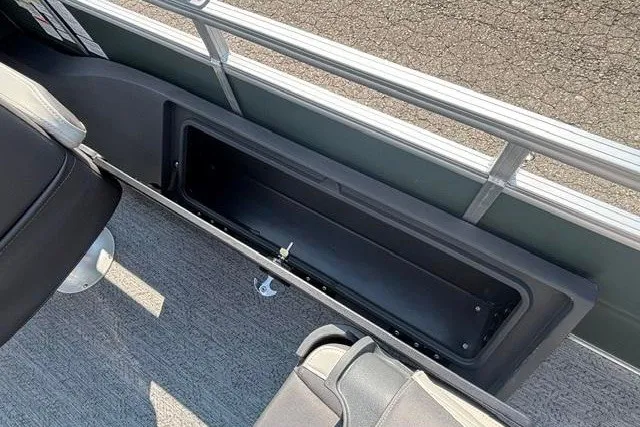 Slide: The Image of Storage compartment on 2026 Sun Tracker Fishin' Barge 22 DLX pontoon boat. - 25