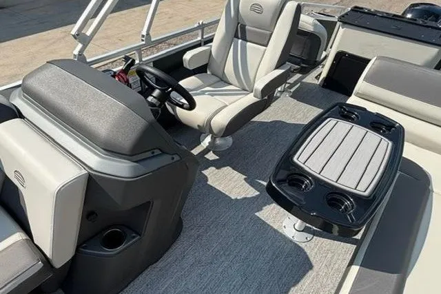 Slide: The Image of Interior of 2026 Sun Tracker Fishin' Barge 22 DLX with seating and table. - 17