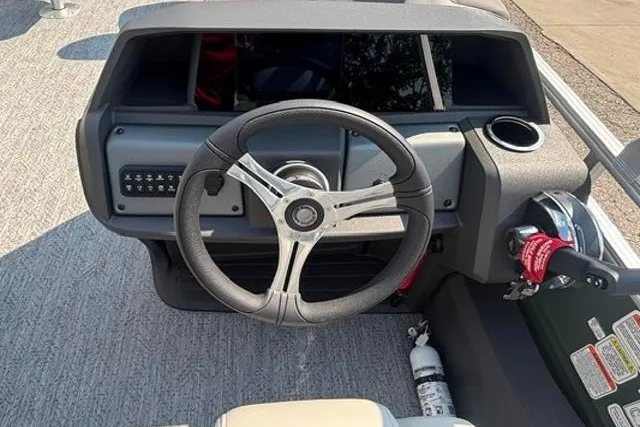 Slide: The Image of Steering console of 2026 Sun Tracker Fishin' Barge 22 DLX pontoon boat. - 19