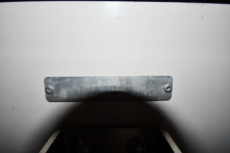 Slide: The Image of Metallic identification plate on a 2015 Edgewater 320CC boat. - 40
