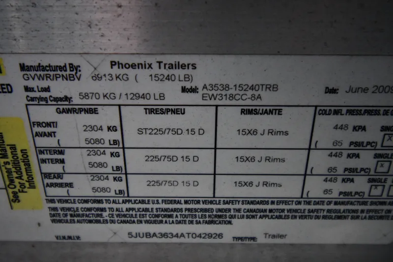 Slide: The Image of Label on Phoenix Trailers, model A3538-15240TRB, detailing weight and tire specifications. - 41