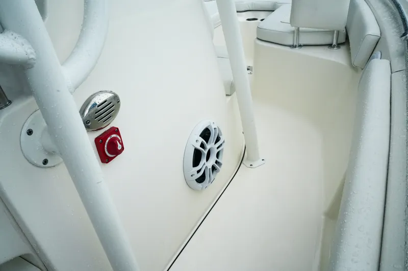 Slide: The Image of 2022 Key West 219 FS boat interior with speaker and control panel. - 27