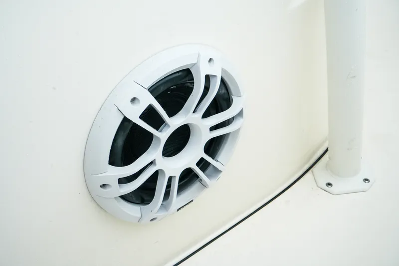 Slide: The Image of White speaker on 2022 Key West 219 FS boat, mounted on a smooth surface. - 28