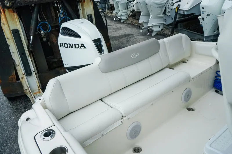 Slide: The Image of 2022 Key West 219 FS boat interior with Honda outboard motor. - 23